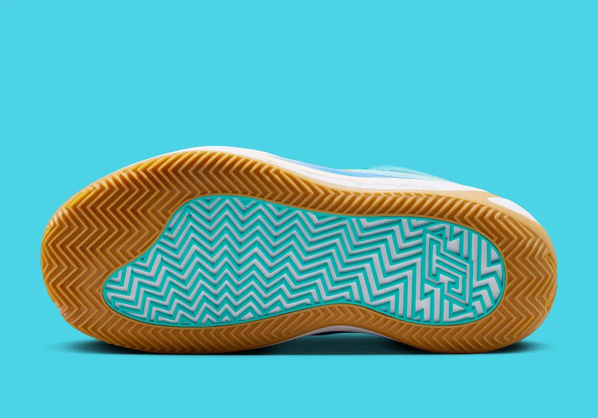 Jordan Tatum 4 in light summer colorway with mesh upper and minimal design accents - detail view 2