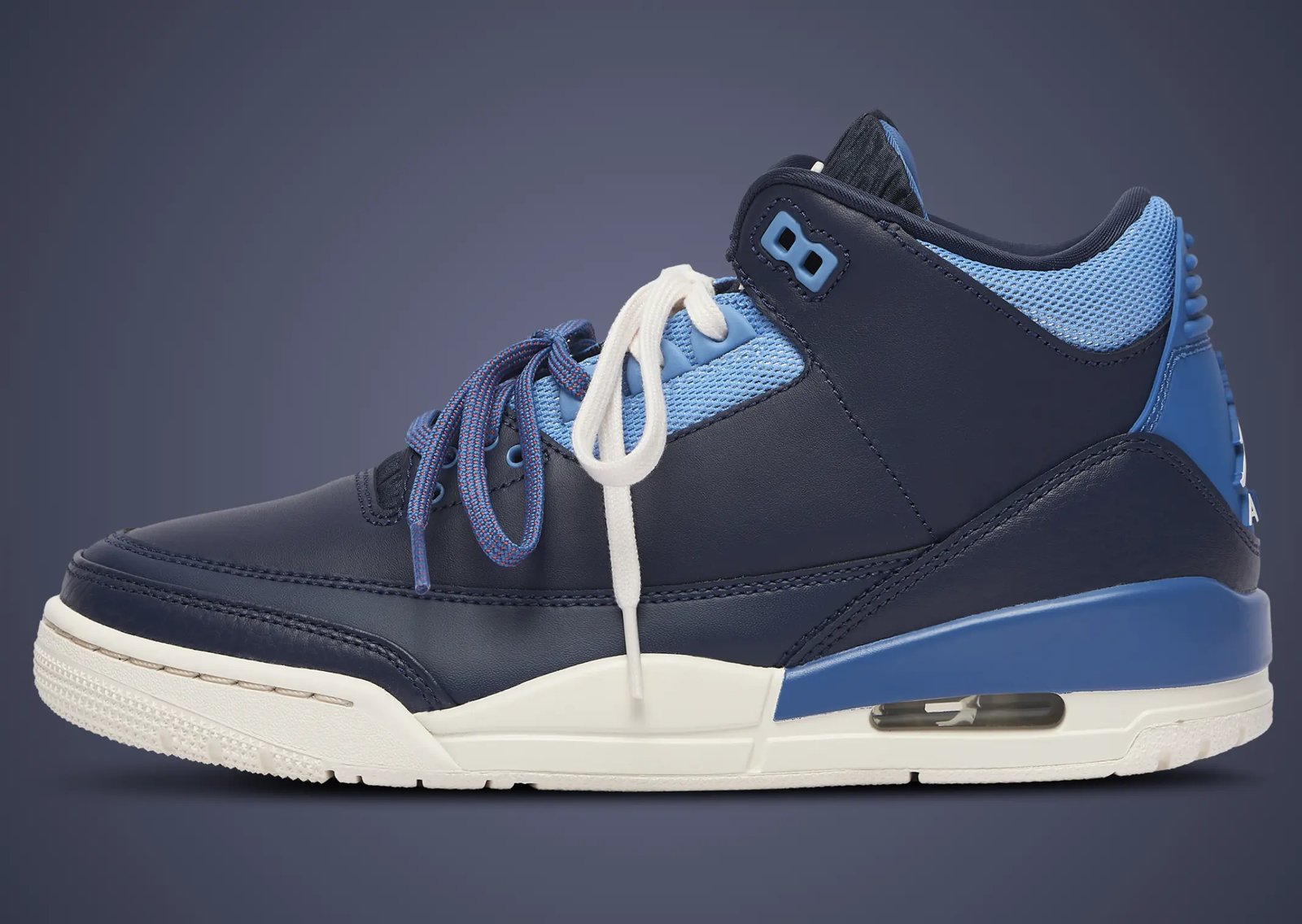 Air Jordan 3 Retro Sports Renaissance women's exclusive showing asymmetric navy, baby blue, and pink colorway with jogger-style tongue detail - detail view 3
