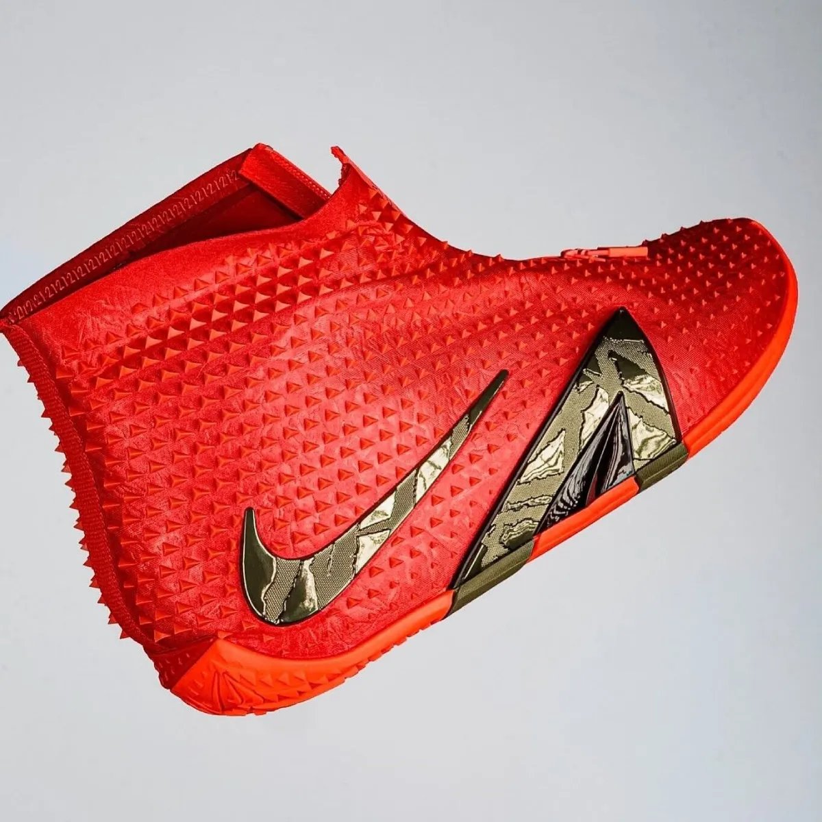 Nike Ja 4 High in University Red with zippered shroud and textured TPU details - detail view 2