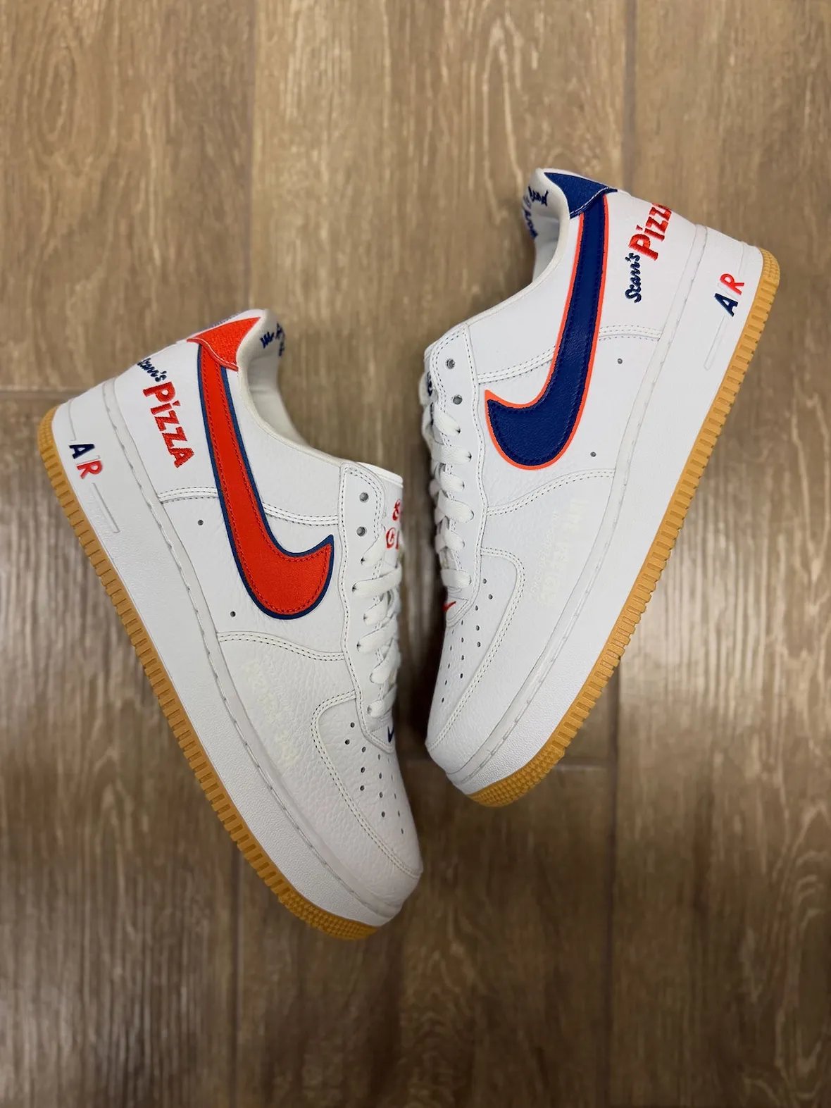 Scarr's Pizza x Nike Air Force 1 Low sample in white pebbled leather with mismatched double-layer Swooshes and updated tongue graphic - detail view 2