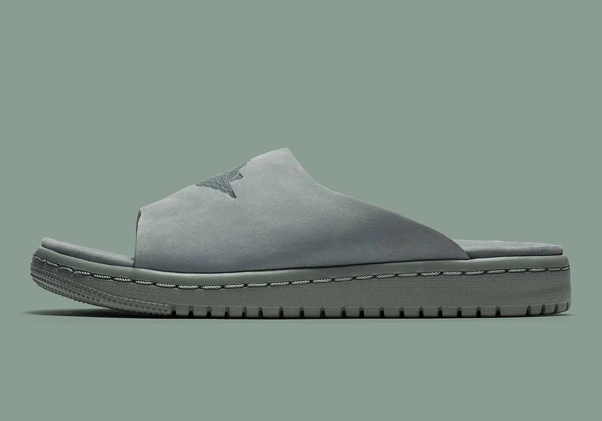Jordan Modero 1 Slide in neutral colorway showing premium material construction and minimal branding - detail view 2