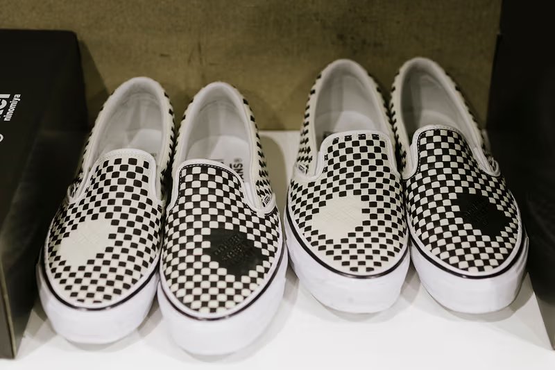 DSM Kei Ninomiya x Vans Slip-On collaboration with custom floral overlays and branded details - detail view 4