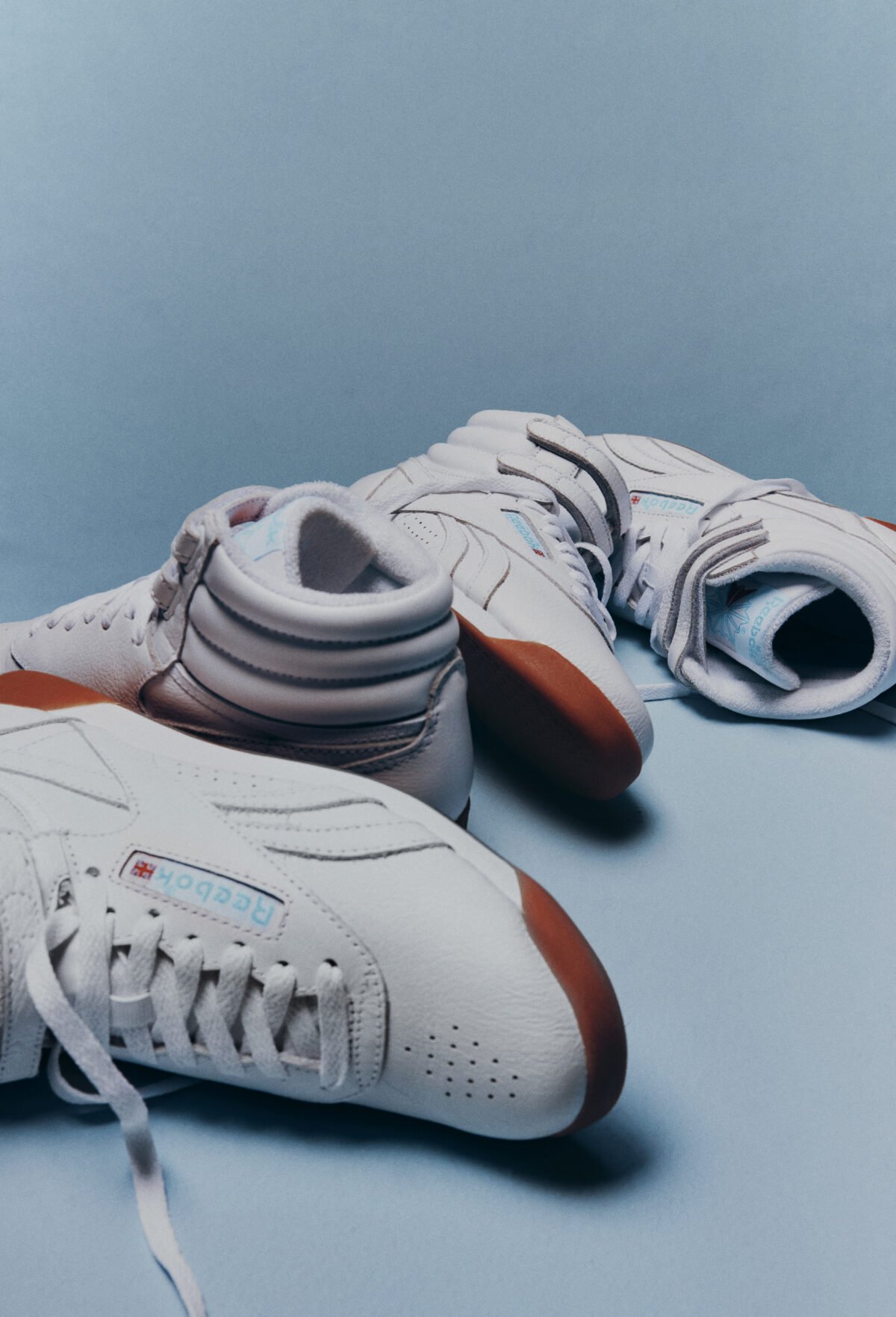 Karol G x Reebok Freestyle Hi 'Born Classic. Worn Together' in Footwear White, Blue, and Gum colorway - detail view 2