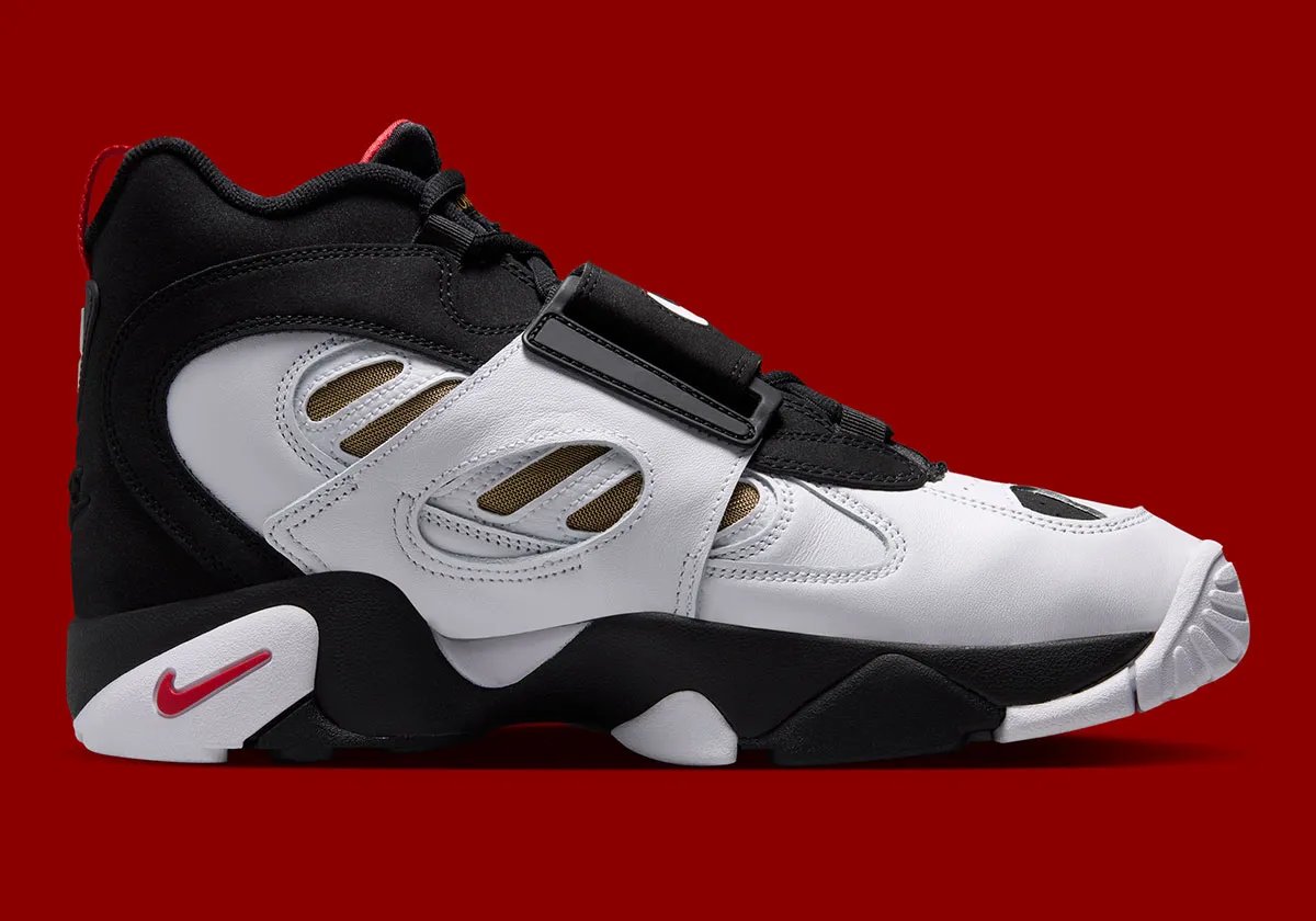 Nike Air Diamond Turf 2 '49ers' in black and white leather with red and gold accents, honoring Deion Sanders' 49ers season - detail view 3
