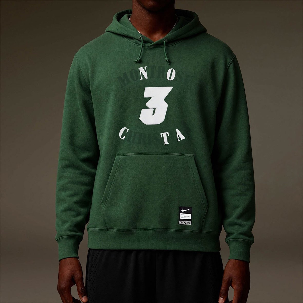 Drake and Kevin Durant NOCTA apparel collection featuring forest green hoodie, jersey, and performance wear with Easy Money graphics - detail view 4