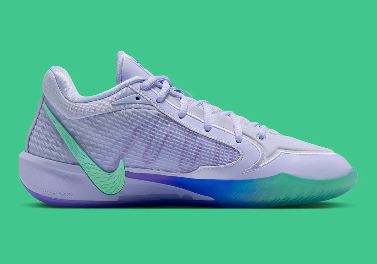Nike Sabrina 4 Superstition colorway featuring pale purple upper with tri-tone gradient of Liberty green, royal blue, and metallic purple on the outsole and Swoosh - detail view 2