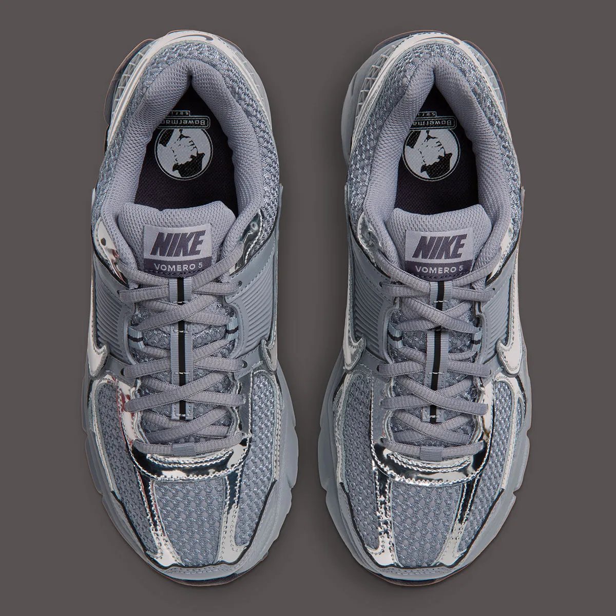 Nike Zoom Vomero 5 Gridiron in dark grey with reflective chrome overlays and black traction unit - detail view 3