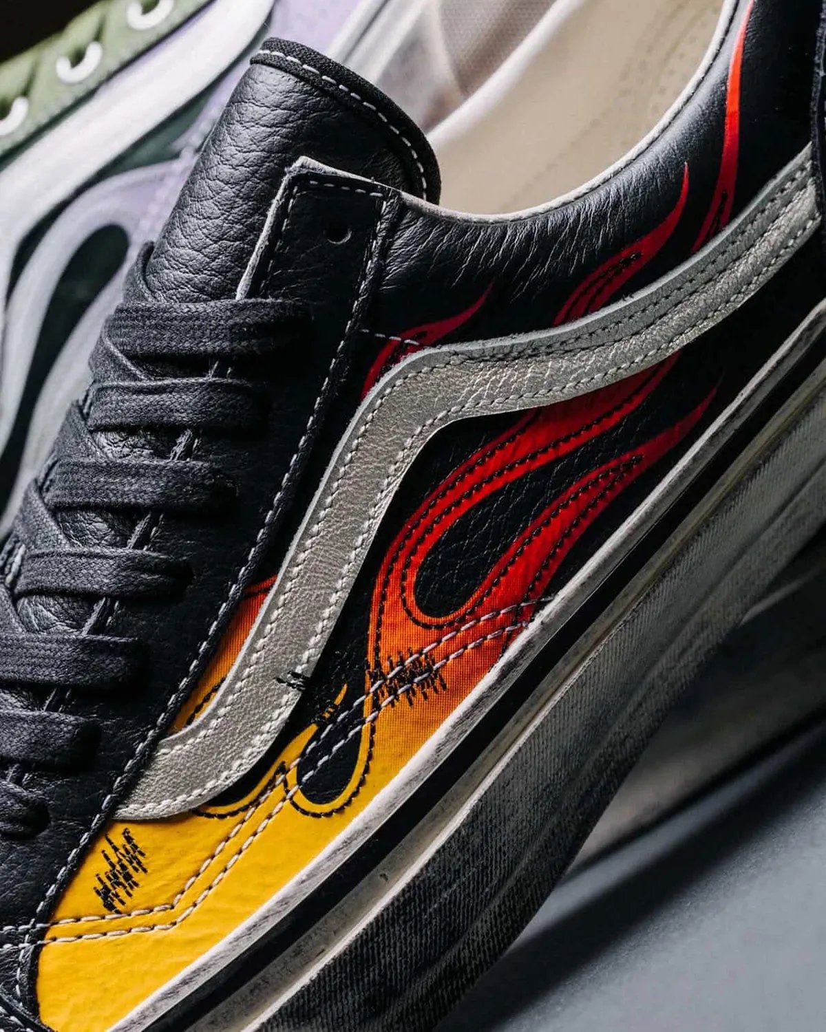Vans Old Skool in Archive Flame colorway showing canvas upper with side stripe detail - detail view 1