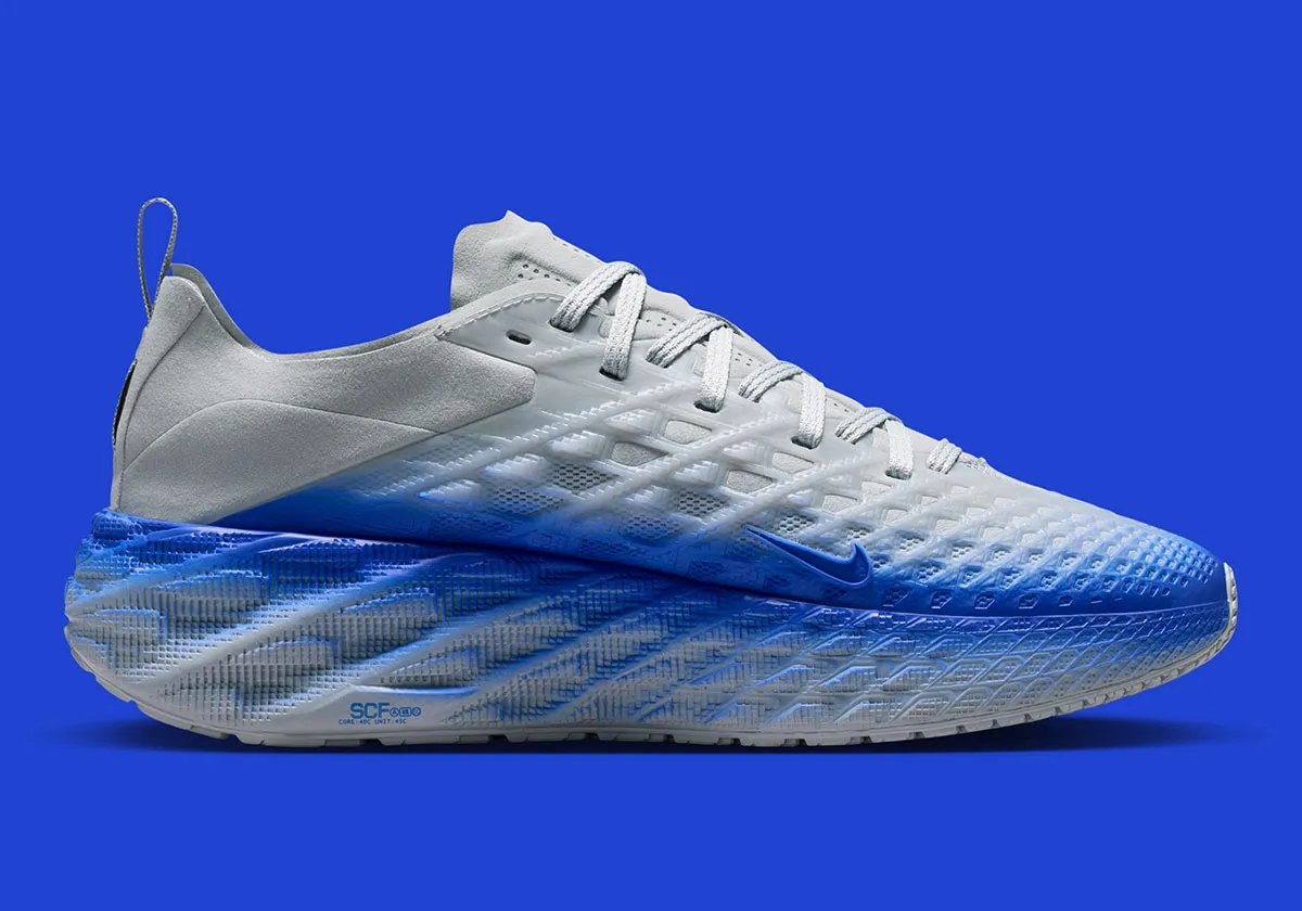 Nike Ava Edge in grey and blue gradient colorway, showcasing pixelated sole design and refined upper construction - detail view 2