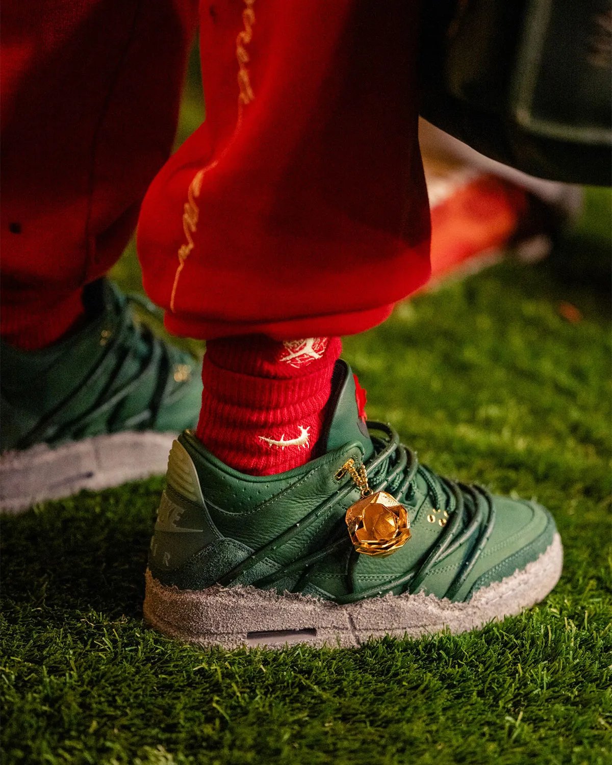 Teyana Taylor wearing Air Jordan 3 Concrete Rose sneakers at NBA All-Star Weekend - detail view 1
