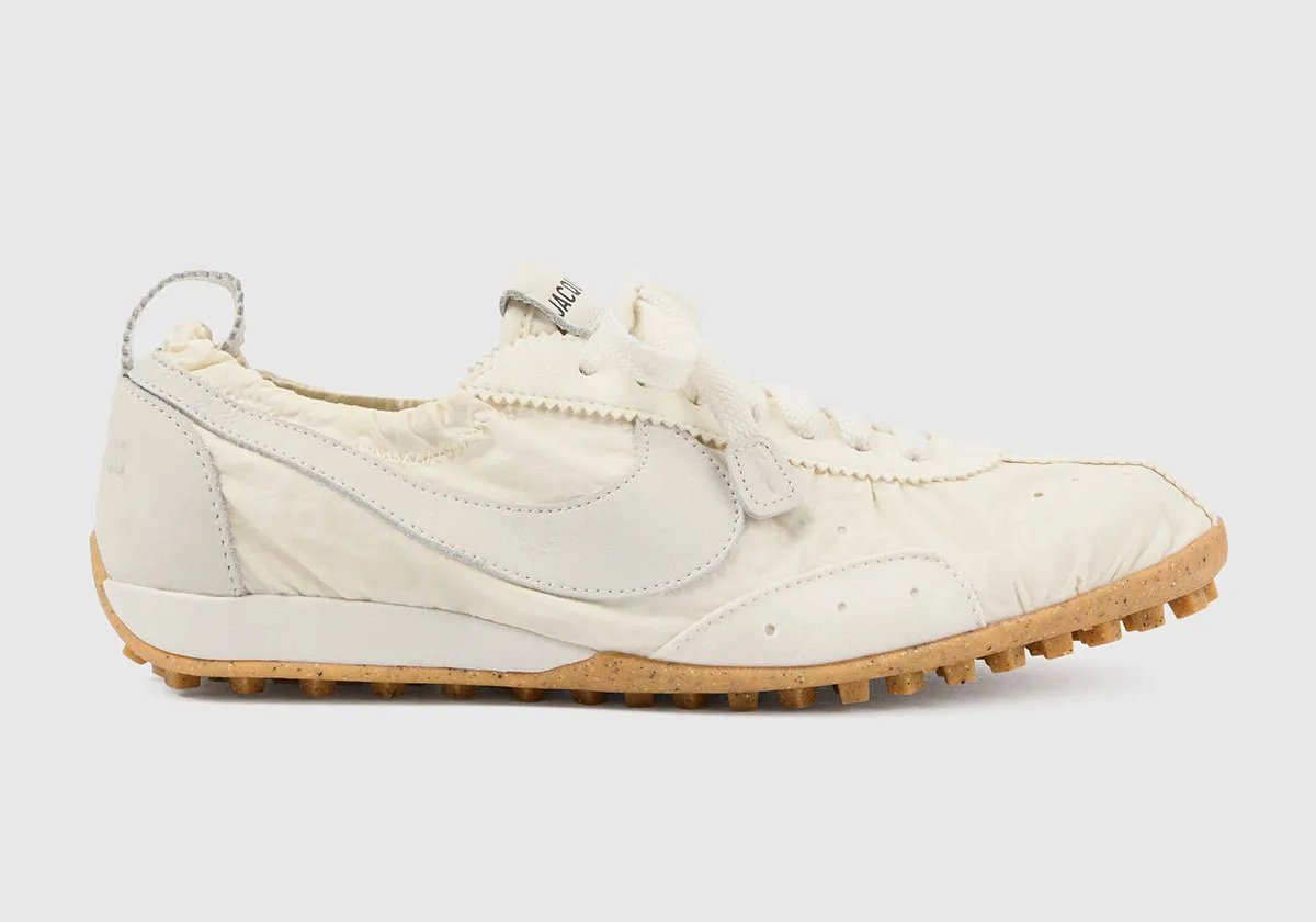 Nike x Jacquemus Moon Shoe collaboration featuring refined proportions and streamlined silhouette - detail view 1