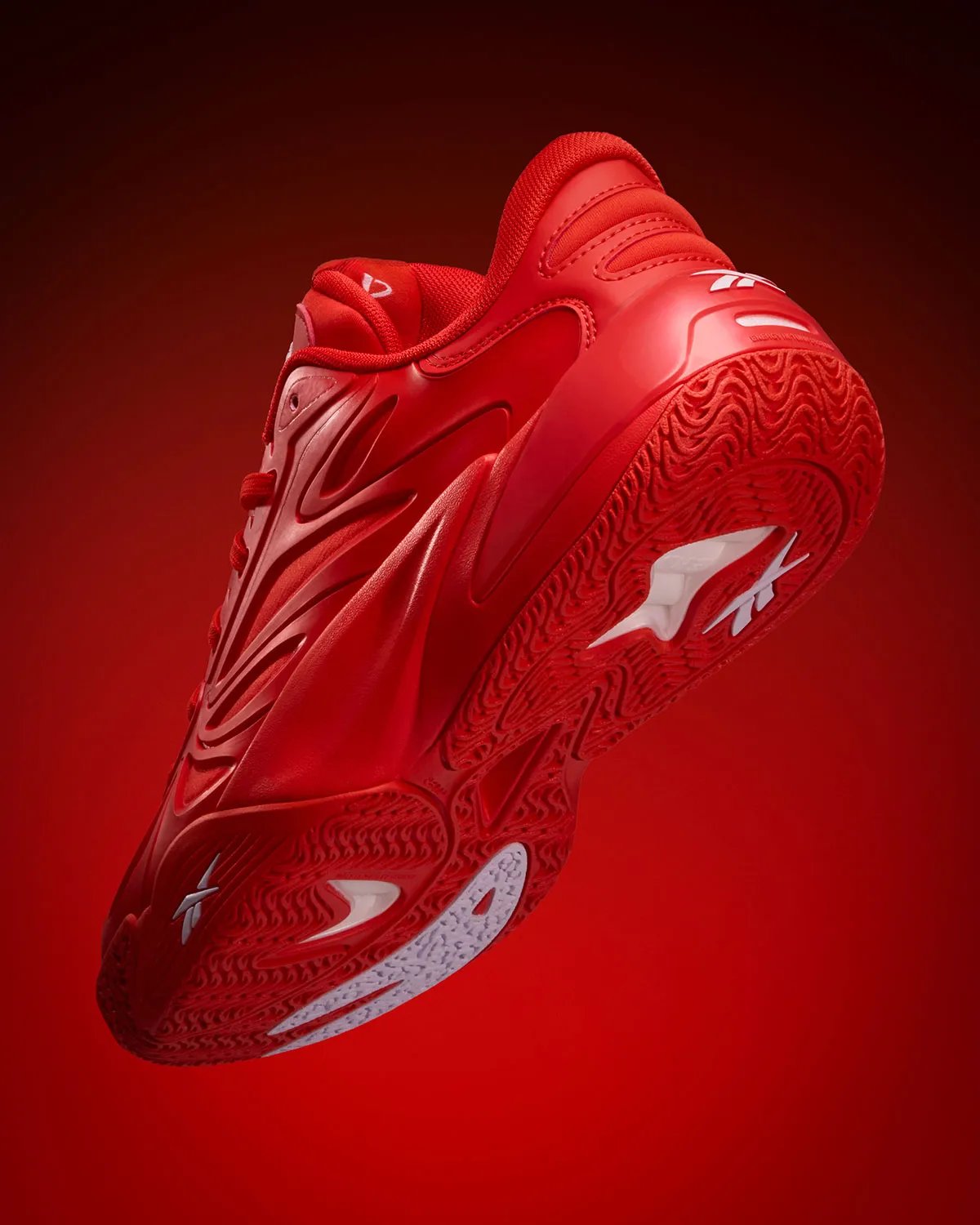 Reebok Angel Reese 1 in Atlanta Dream red with white branding, lateral view - detail view 1