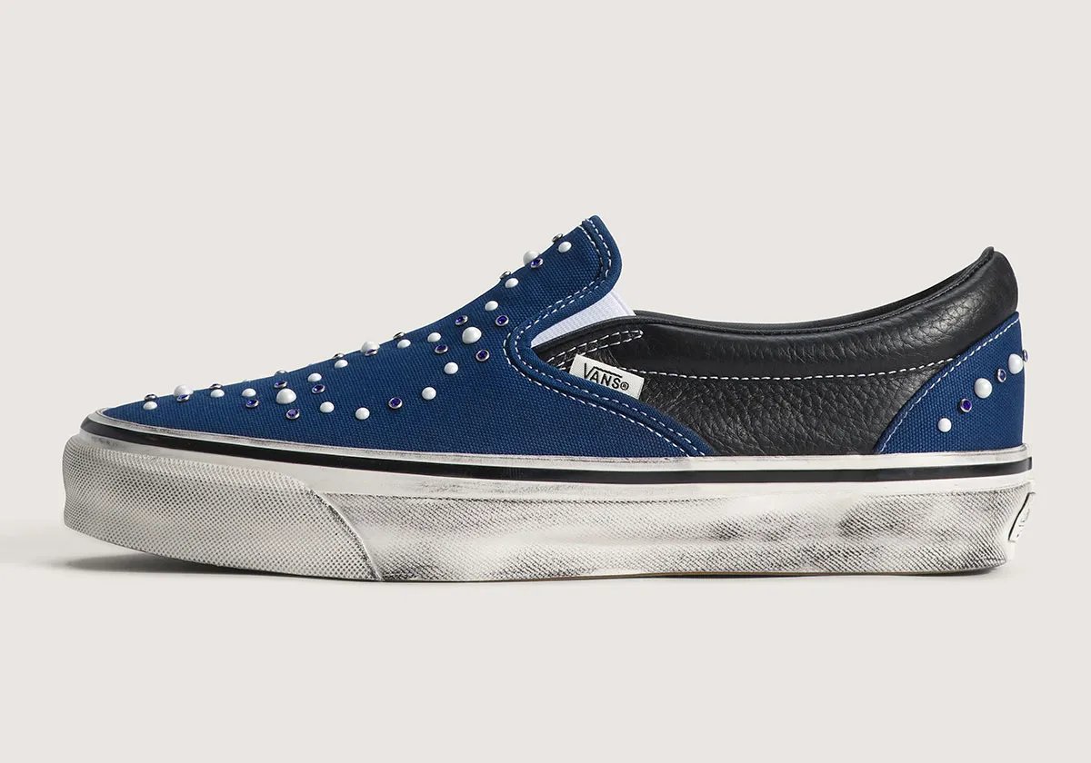 Vans Slip-On in Satoshi Nakamoto-inspired colorway, showing canvas upper and vulcanized sole detail - detail view 1