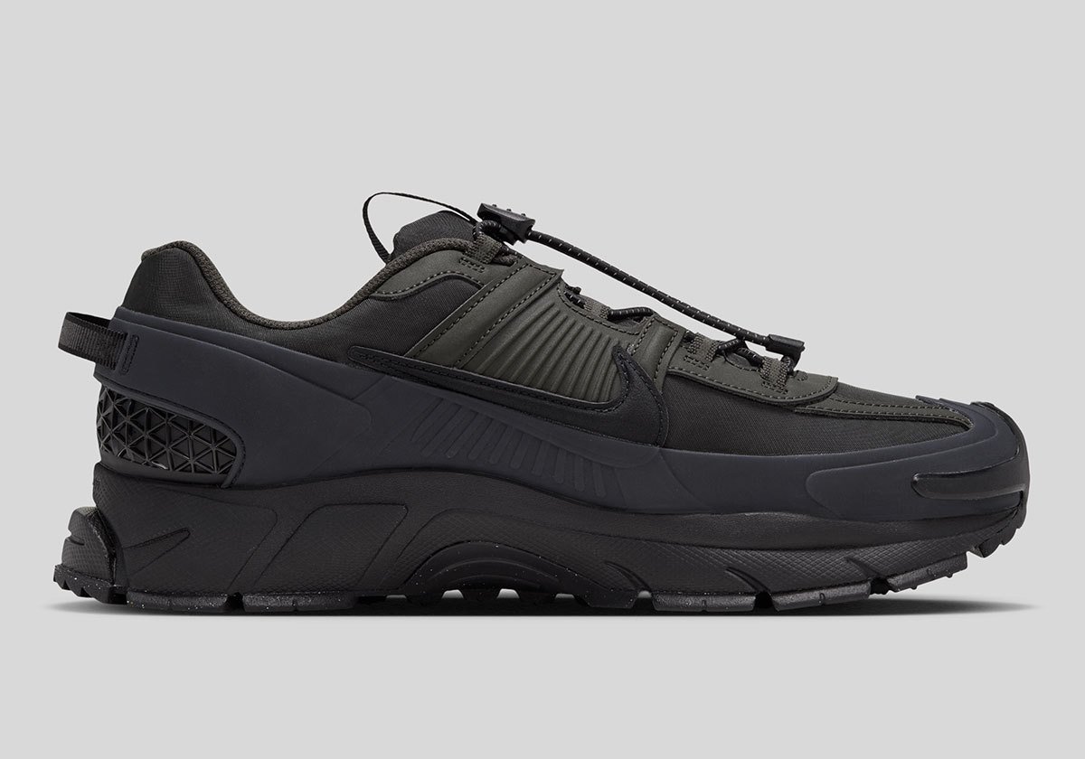 Nike Zoom Vomero 5 Roam in Sequoia and Black colorway with reinforced mudguards and updated traction pattern - detail view 2