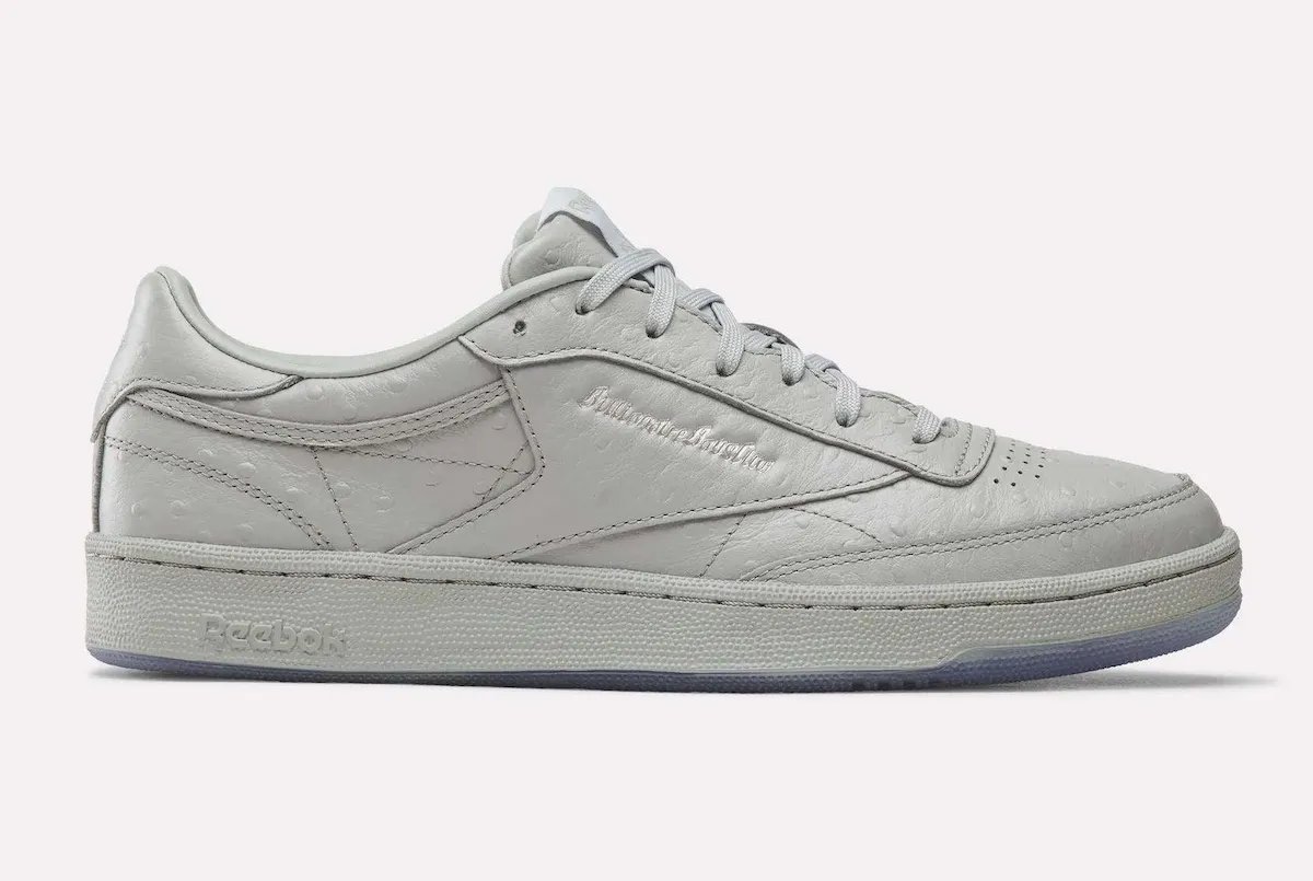 Billionaire Boys Club x Reebok Club C 85 in grey leather with translucent sole featuring astronaut mascot and purple background - detail view 2