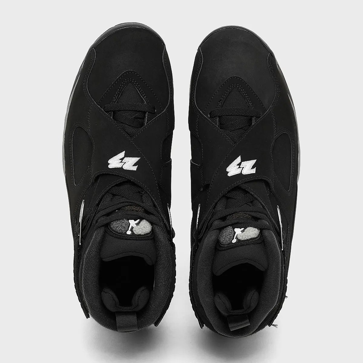 Air Jordan 8 Black Chrome featuring black upper with chrome accents and white/grey/black mudguard detailing - detail view 2