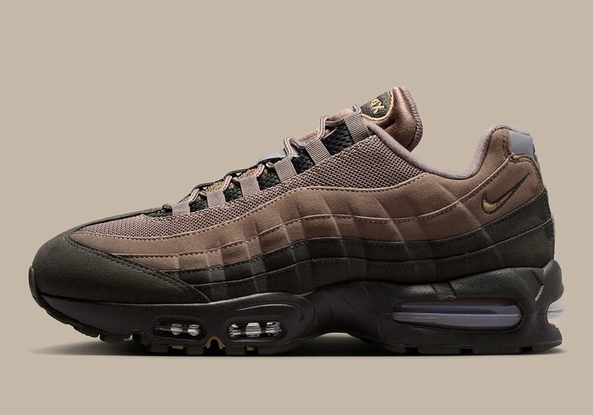 Nike Air Max 95 in Mink Brown gradient with chocolate ombre upper and blue Air units, shown from lateral side view - detail view 1