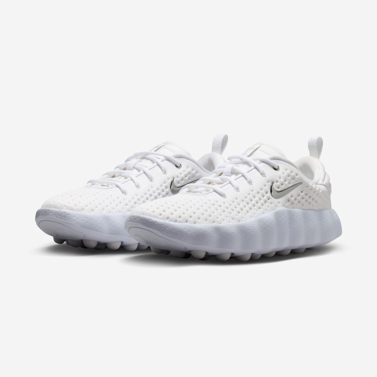 Nike Mind 002 Triple White colorway in white, grey, and metallic silver, releasing July 23, 2026 - detail view 1