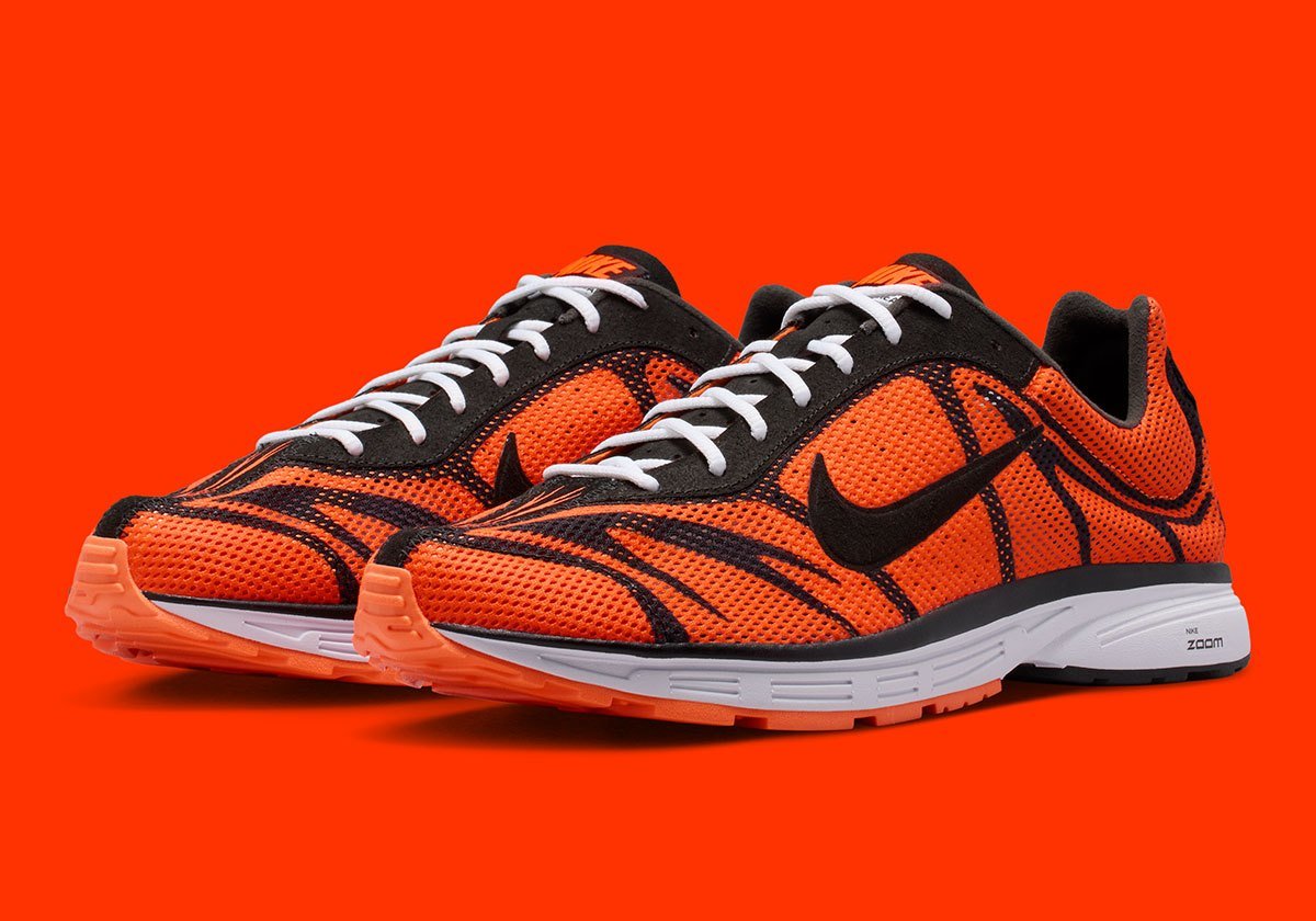 Nike Zoom Streak 3 in Safety Orange colorway with black stripes and white accents on laces and sole