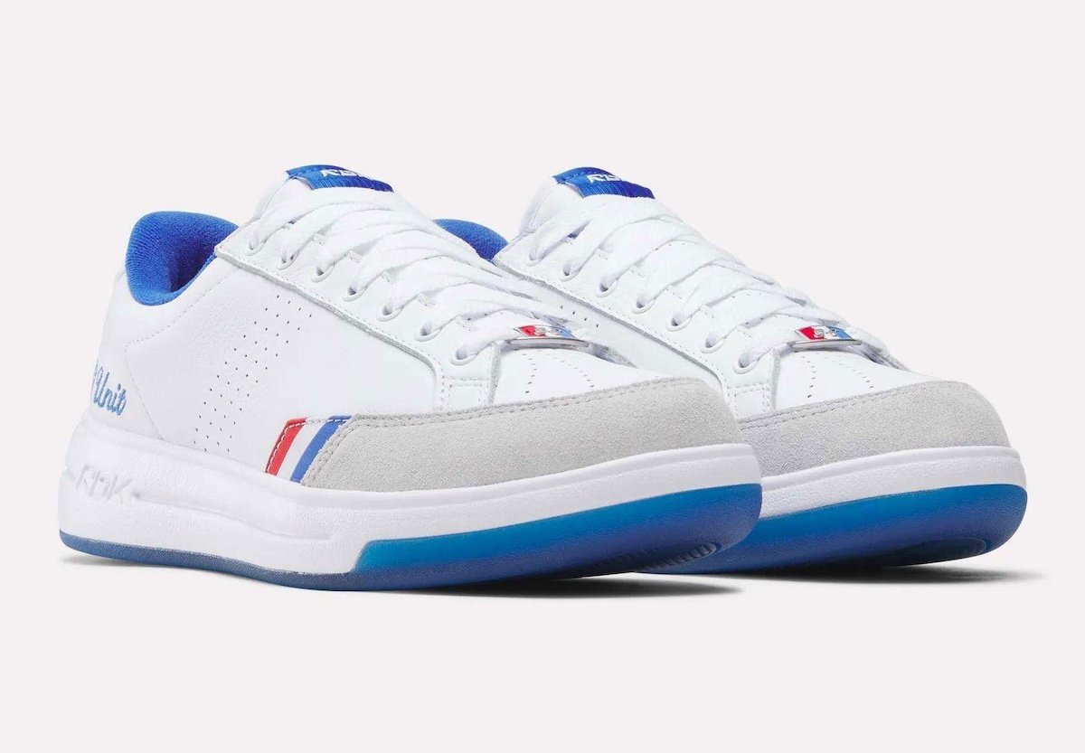 Reebok G-Unit G6 retro sneaker in white leather with light grey suede toe and royal blue accents, releasing August 2026 - detail view 2