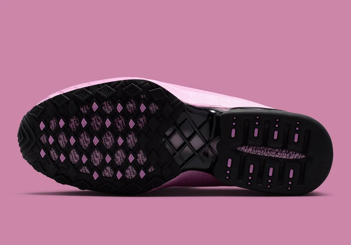 Nike Air Max Dolce Light Magenta colorway featuring gridded tongue cage, notched side panels, and translucent Air bubble sole - detail view 5