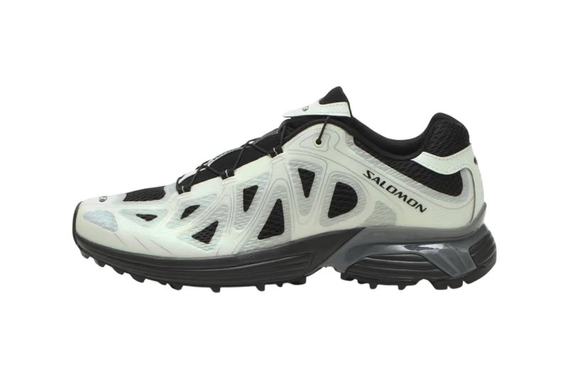 Salomon XT-WHISPER VOID in Black/Clearly Aqua colorway featuring translucent synthetic cage overlay and 3D mesh upper - detail view 2