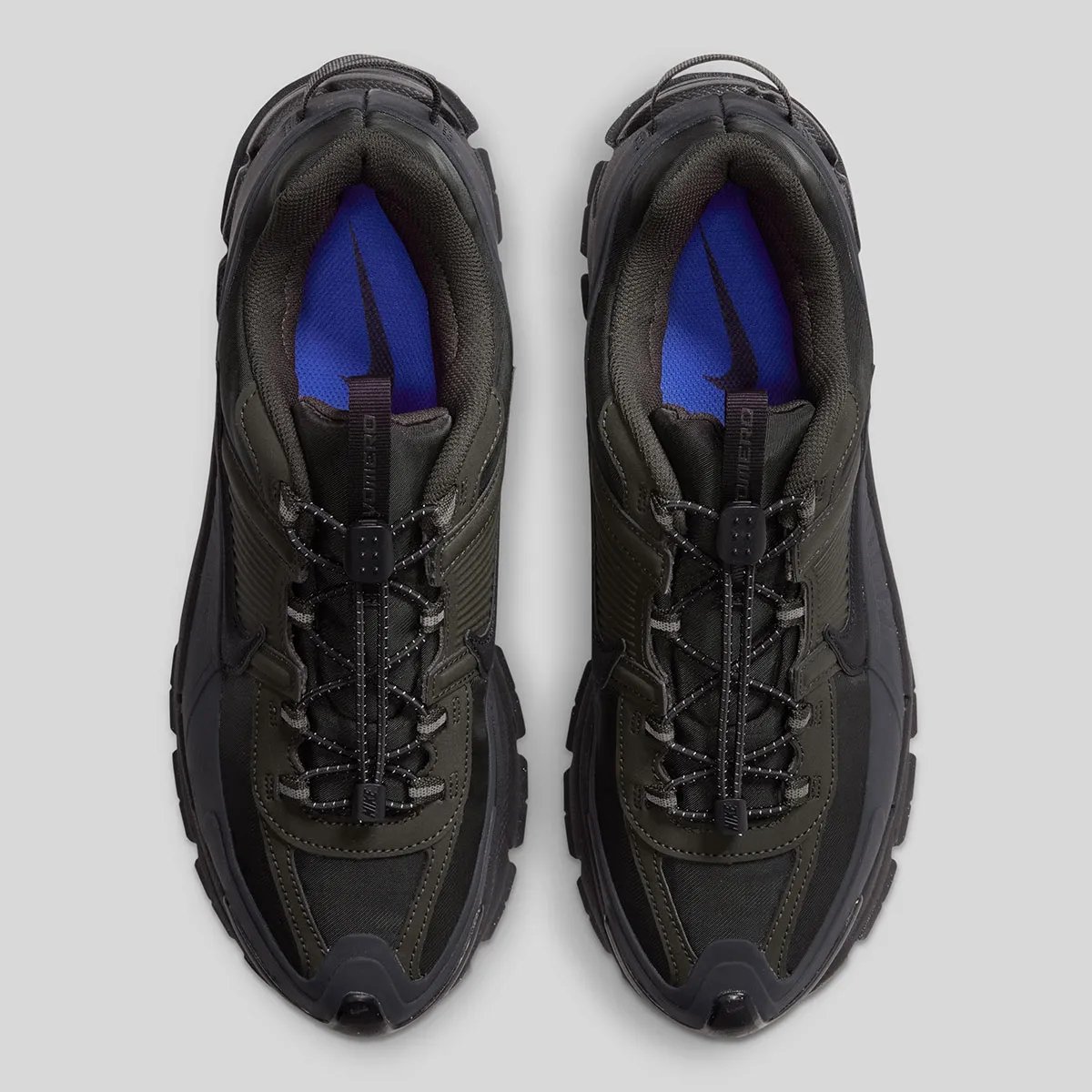 Nike Zoom Vomero 5 Roam in Sequoia and Black colorway with reinforced mudguards and updated traction pattern - detail view 3