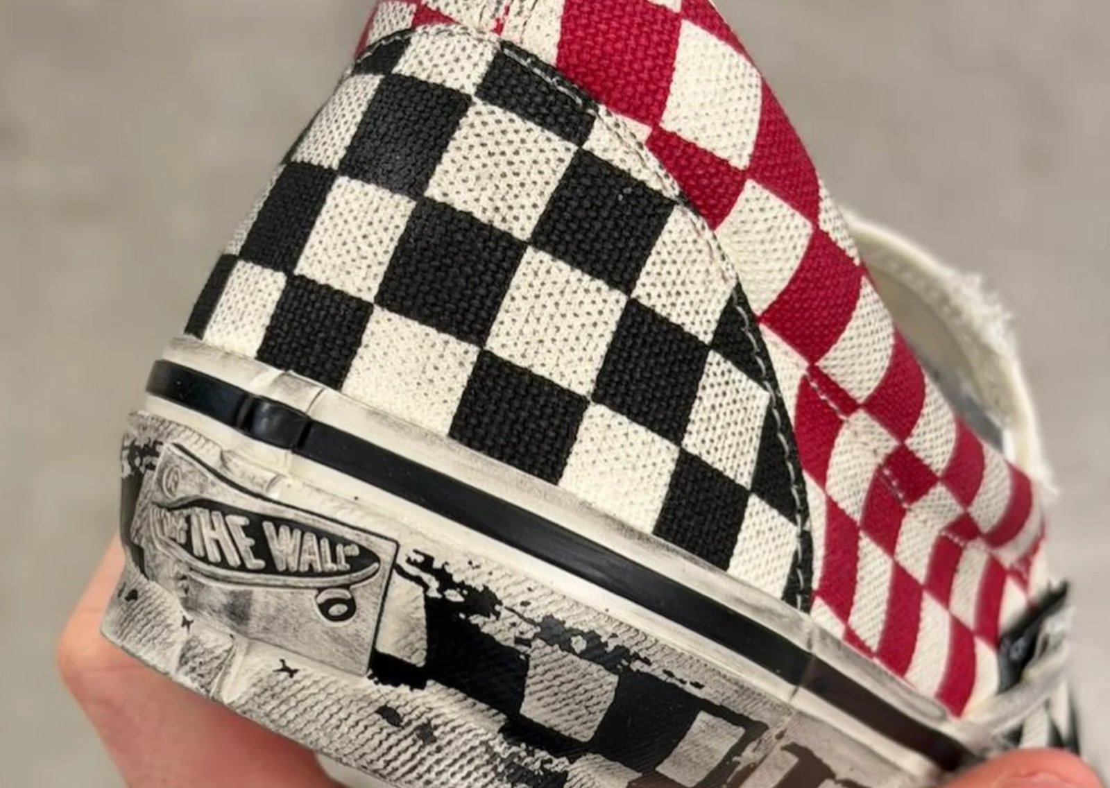 Slam Jam x Vans Classic Slip-On Act of Disagreement featuring dual checkerboard patterns in black-white and red-white colorways with distressed detailing - detail view 2