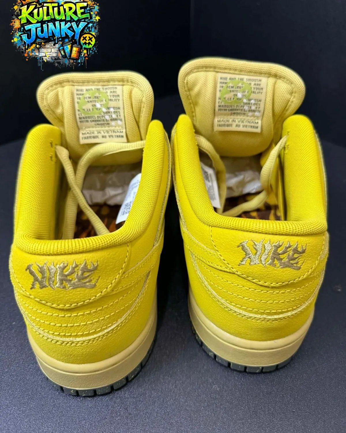 Nike SB Dunk Low in Saffron Quartz with flame graphics on the upper - detail view 3