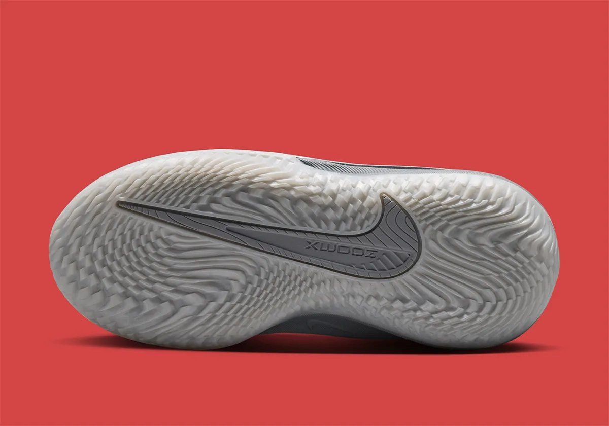Nike GT Cut 4 in Metallic Silver colorway, full side profile view showing chrome-coated upper - detail view 5