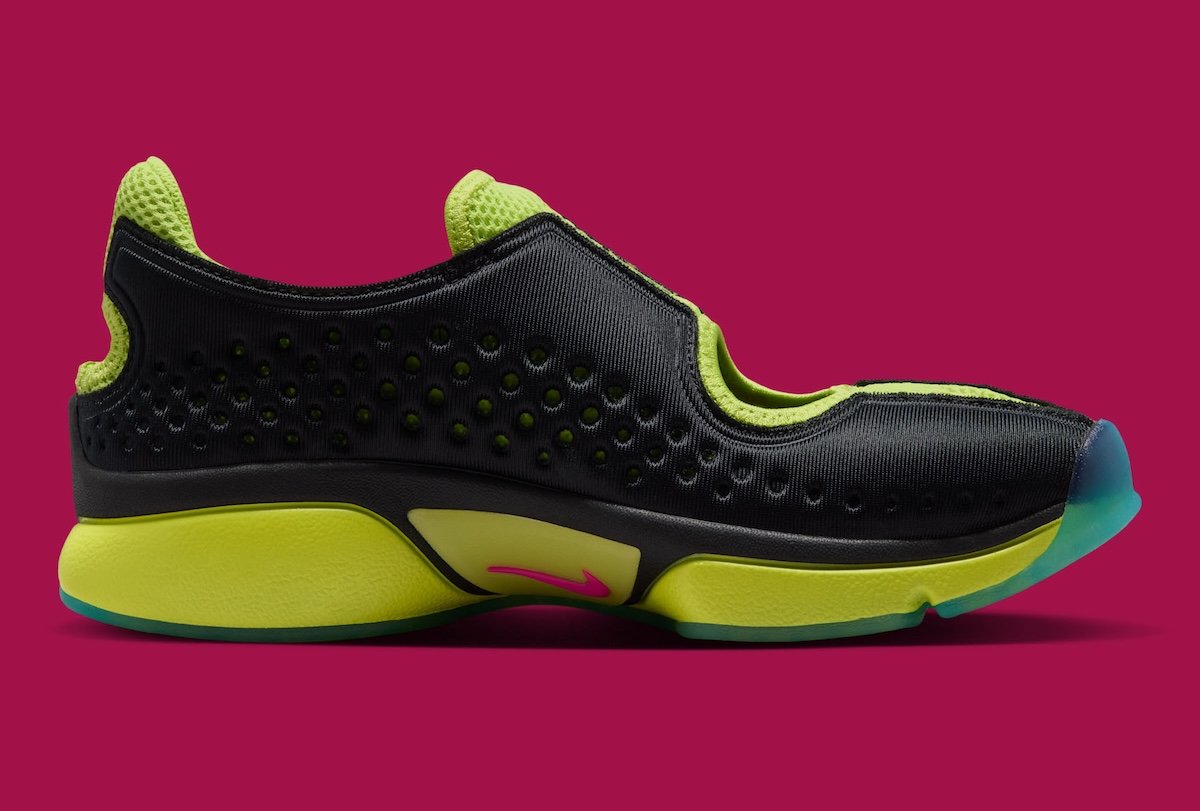 Nike Air Rift x MoMA collaboration sneaker in green-and-pink colorway, featuring split-toe design and museum branding on lace panel - detail view 4