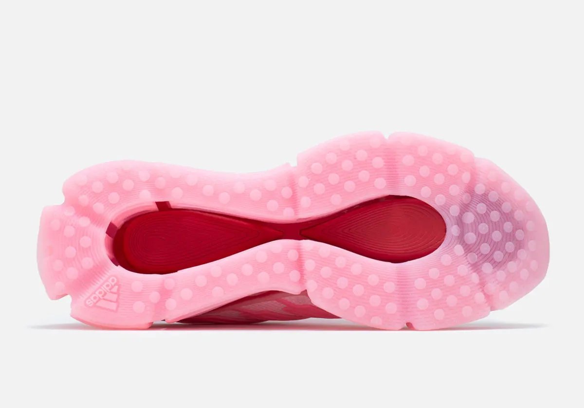 Willy Chavarria x adidas Megaride AG Powder Red showing monochromatic red upper with oversized TPU tunnel midsole - detail view 2