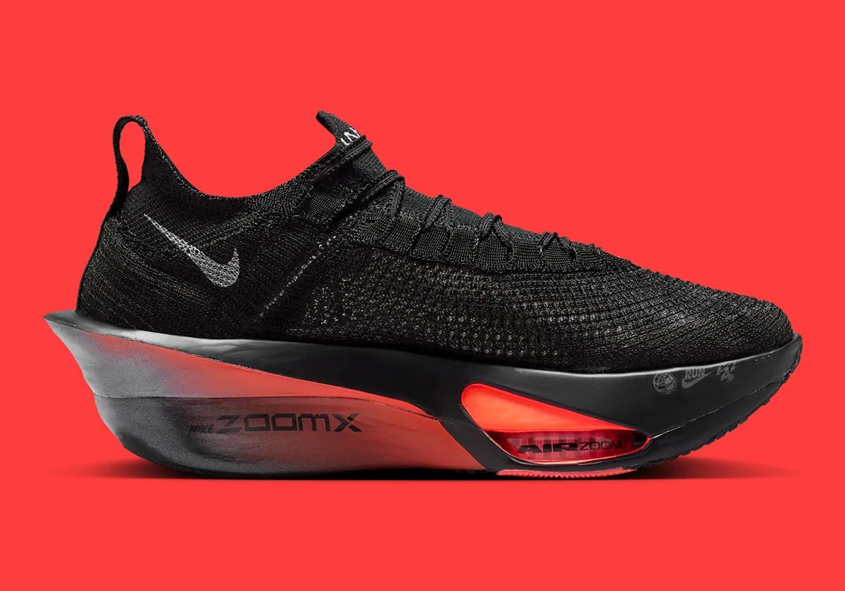Nike Alphafly 3 in Black, Hyper Crimson, and Wolf Grey with silver Swoosh carabiner clip - detail view 3