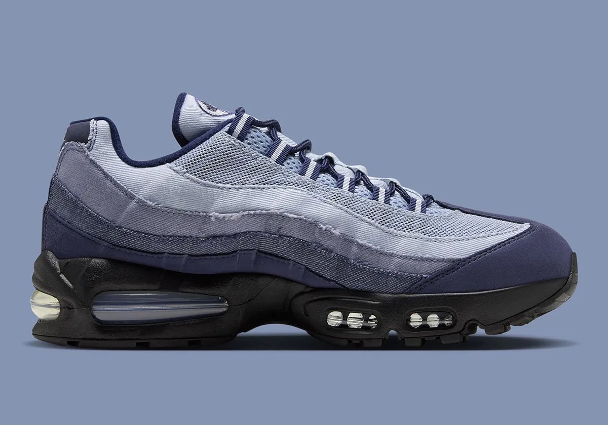 Nike Air Max 95 Ashen Slate displaying gradient denim construction across side overlays with light blue, medium, and dark denim tones - detail view 3