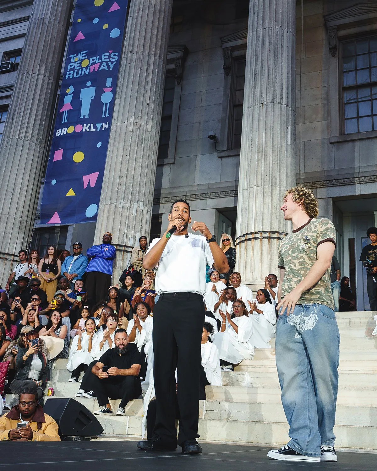 Models and emerging designers wearing Converse Chuck Taylor Throwback silhouettes during KidSuper's The People's Runway at Brooklyn's Borough Hall during NYFW 2025 - detail view 5
