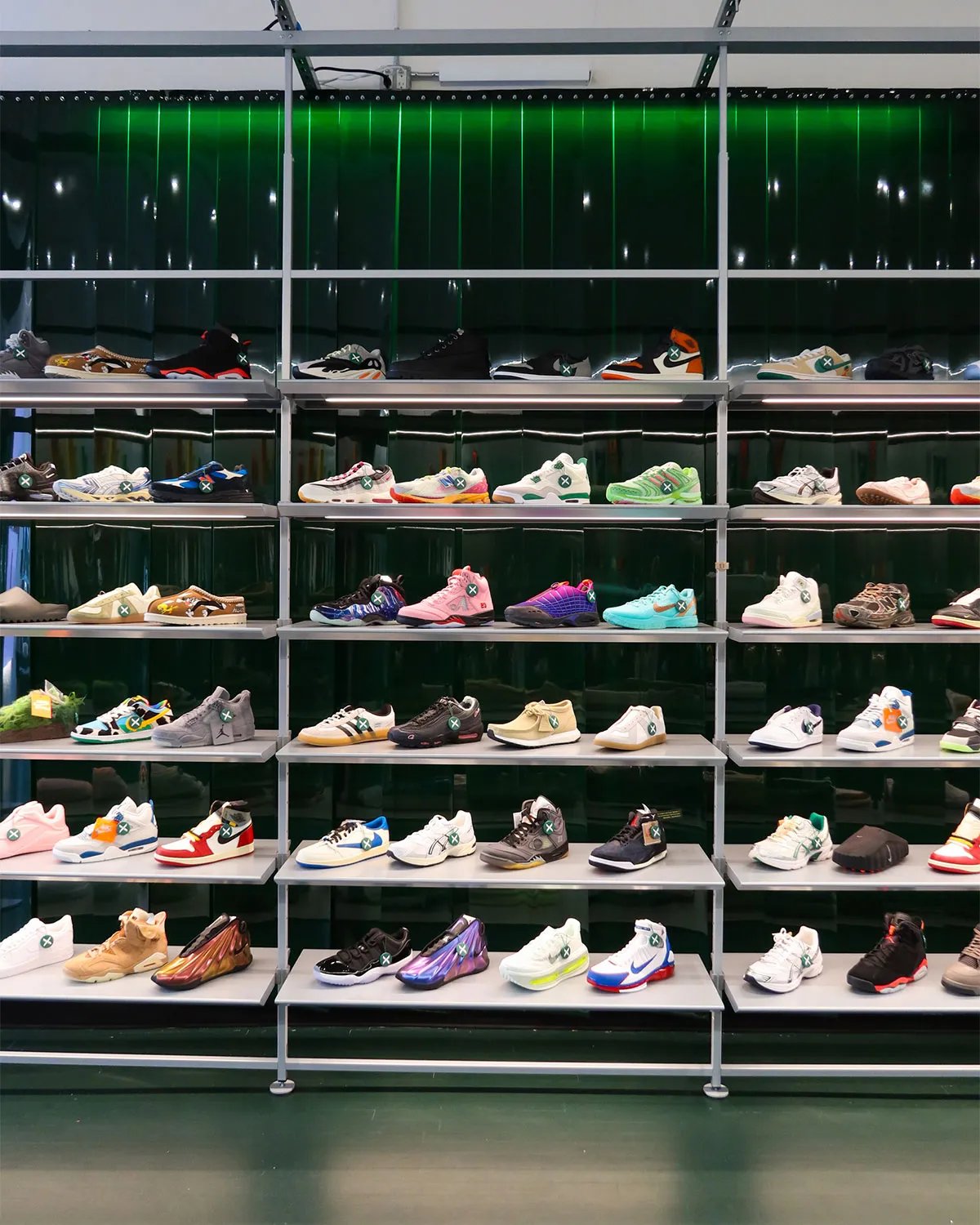 Interior view of StockX's renovated NYC flagship store in SoHo, displaying sneaker inventory and retail display fixtures - detail view 2