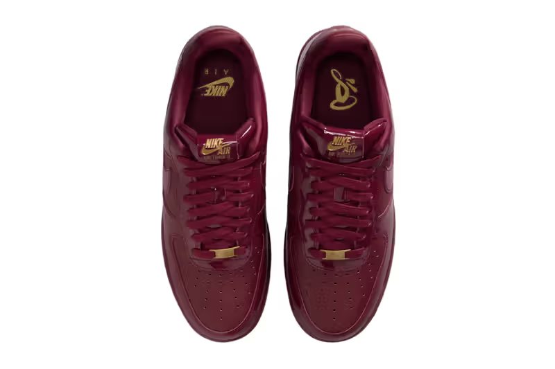 Syna x Nike Air Force 1 '07 Dark Beetroot and Red Oxide colorway with metallic gold accents, lateral view - detail view 4