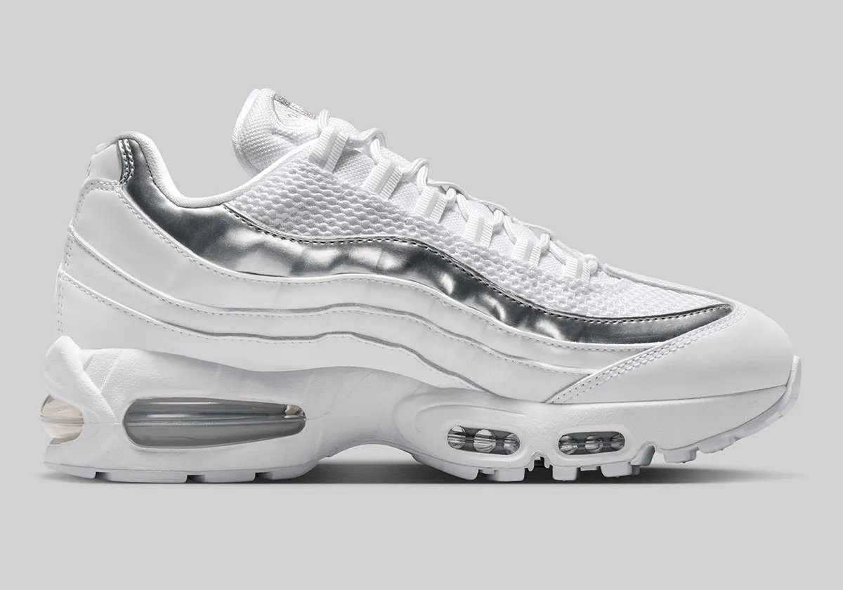 Nike Air Max 95 in pure white with metallic silver accents on mudguard and visible Air Unit - detail view 3