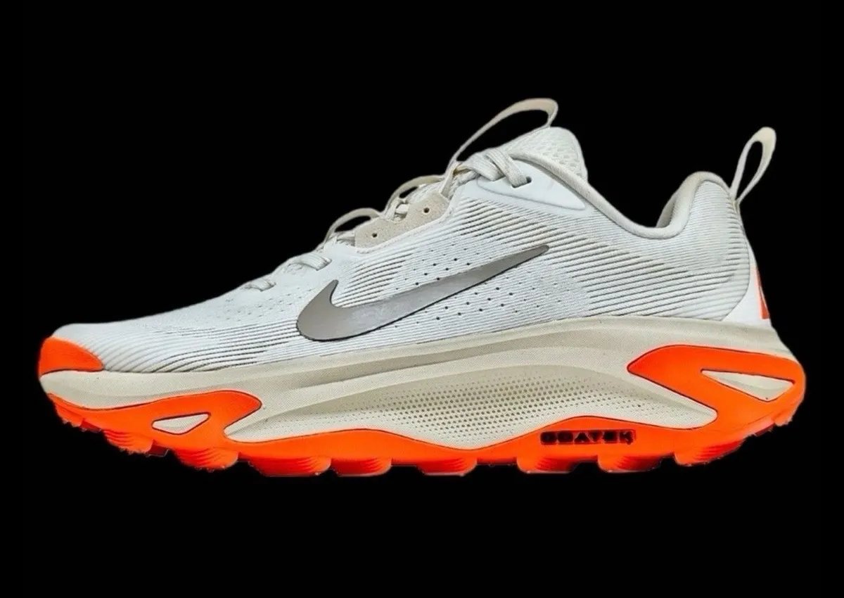 Nike ACG Juniper in Summit White and College Grey with molded sole unit, showing textured synthetic upper - detail view 2