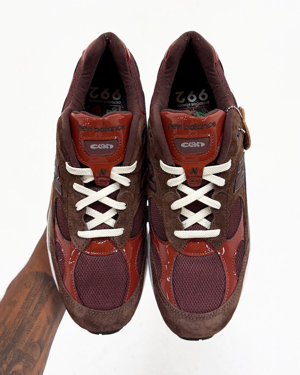 Amine x New Balance 992 Outdoor School in brown suede with red patent leather panels and blue sole accents - detail view 2