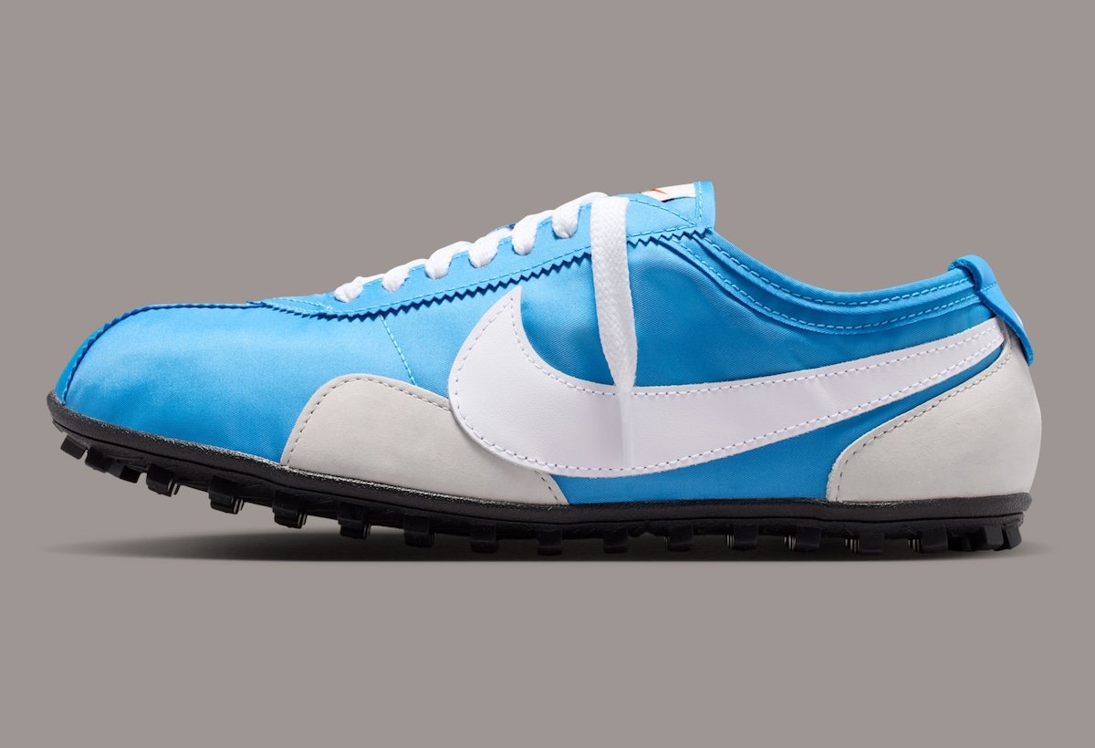 Nike Moon Shoe in Italy Blue colorway with bright blue nylon upper, white leather Swoosh, and light grey suede details - detail view 3