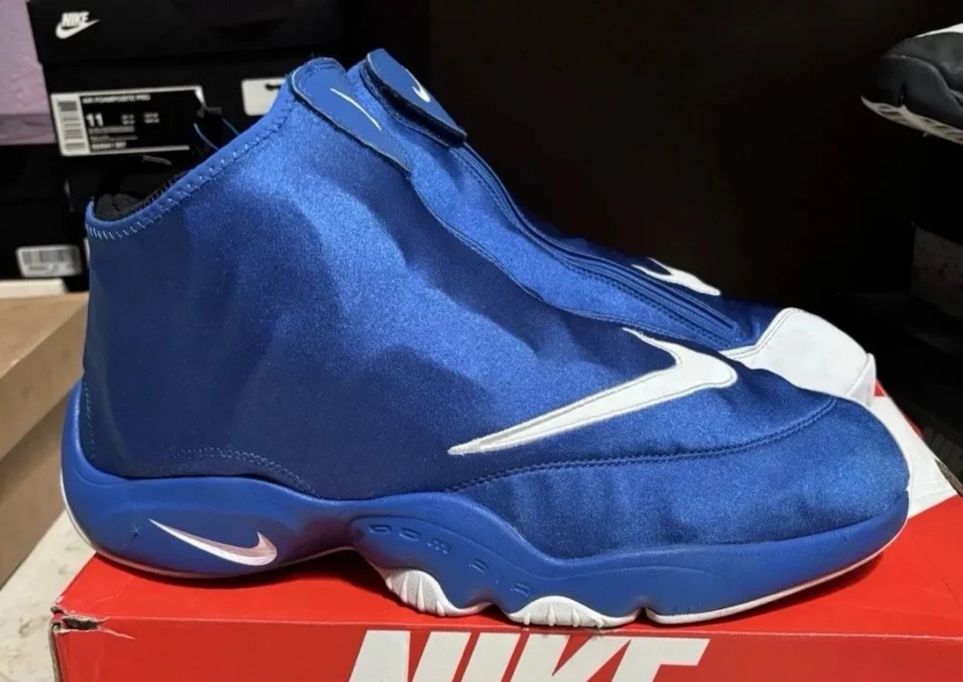 Nike Air Zoom Flight The Glove Royal Blue with zippered shroud and white Swoosh details, scheduled for December 2026 release
