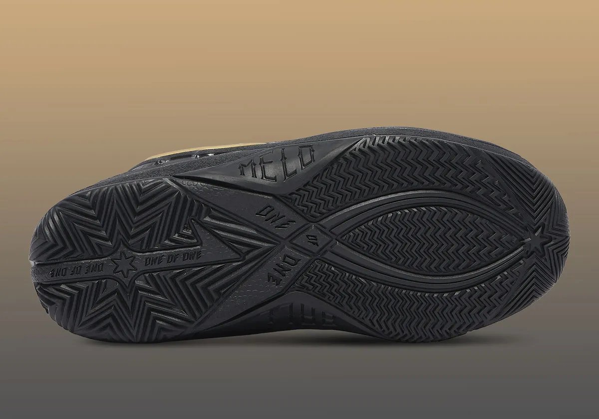 PUMA MB.06 in Black with metallic gold accents on tattoo-inspired graphics, LaMelo Ball signature model - detail view 2