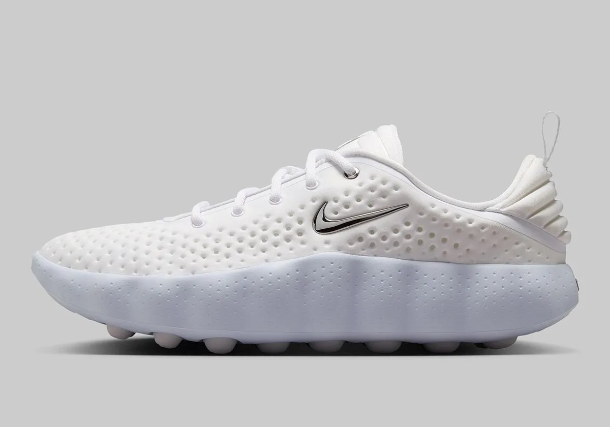 Nike Mind 002 in Vast Grey colorway with white, Anthracite, and Metallic Silver Swoosh - detail view 1