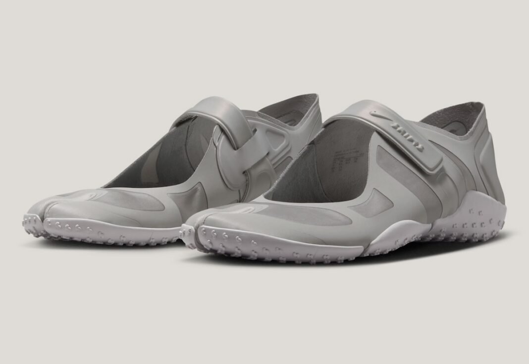 Nike SKIMS Rift Satin in Night Silver with tonal grey colorway, showing split-toe design and stretch textile upper with molded support panels - detail view 1