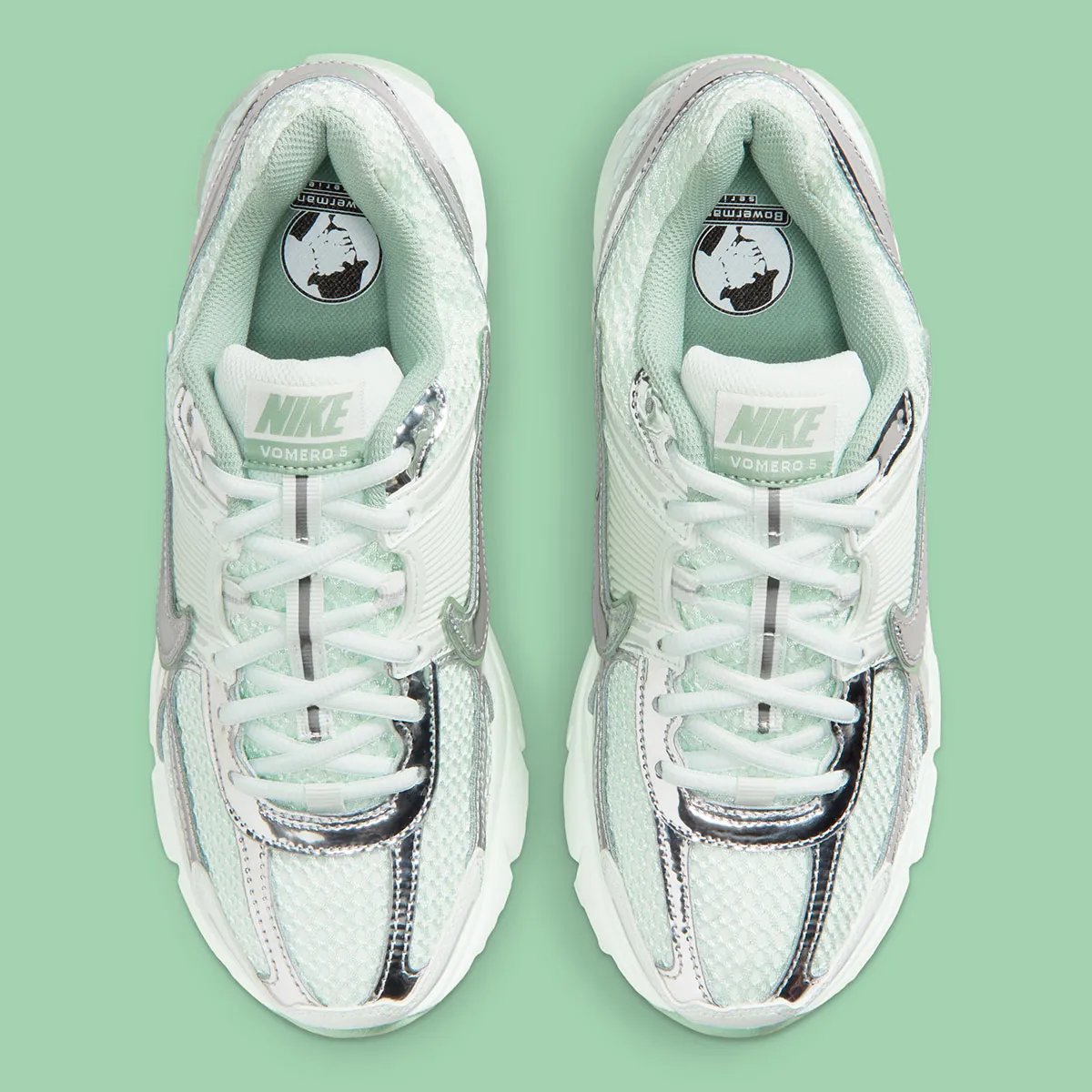 Nike Zoom Vomero 5 in Barely Green with metallic silver chrome accents and dual Swoosh detail - detail view 4