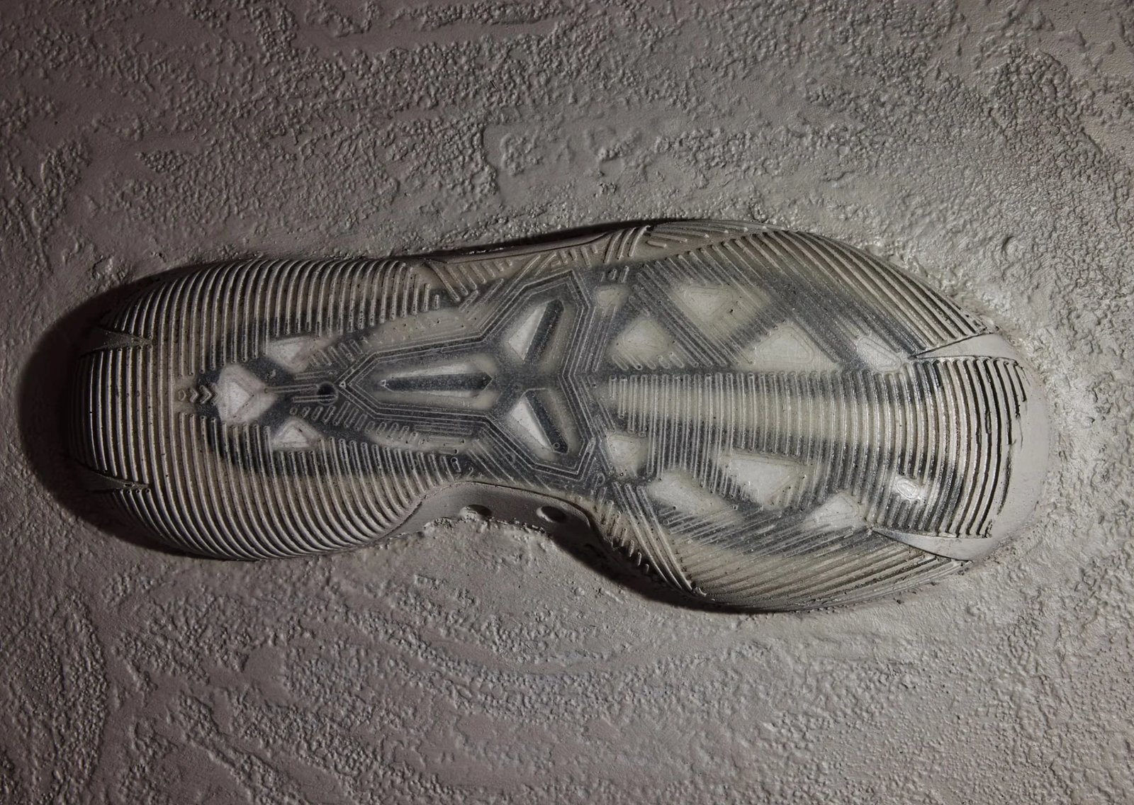 Troy Murray's mural featuring Nike Kobe signature silhouettes from Kobe 1 through Kobe AD, with an unreleased model at the end displaying a semi-transparent outsole design. - detail view 3
