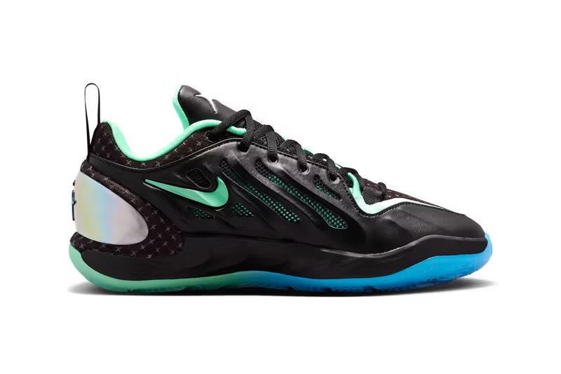 Nike A'Two "Nike Nationals" in black with Blue Glow and Green Glow accents, side profile showing Cushlon 3.0 midsole and Air Zoom technology - detail view 3
