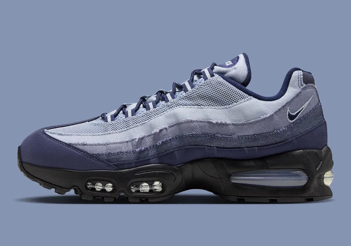 Nike Air Max 95 Ashen Slate displaying gradient denim construction across side overlays with light blue, medium, and dark denim tones - detail view 1