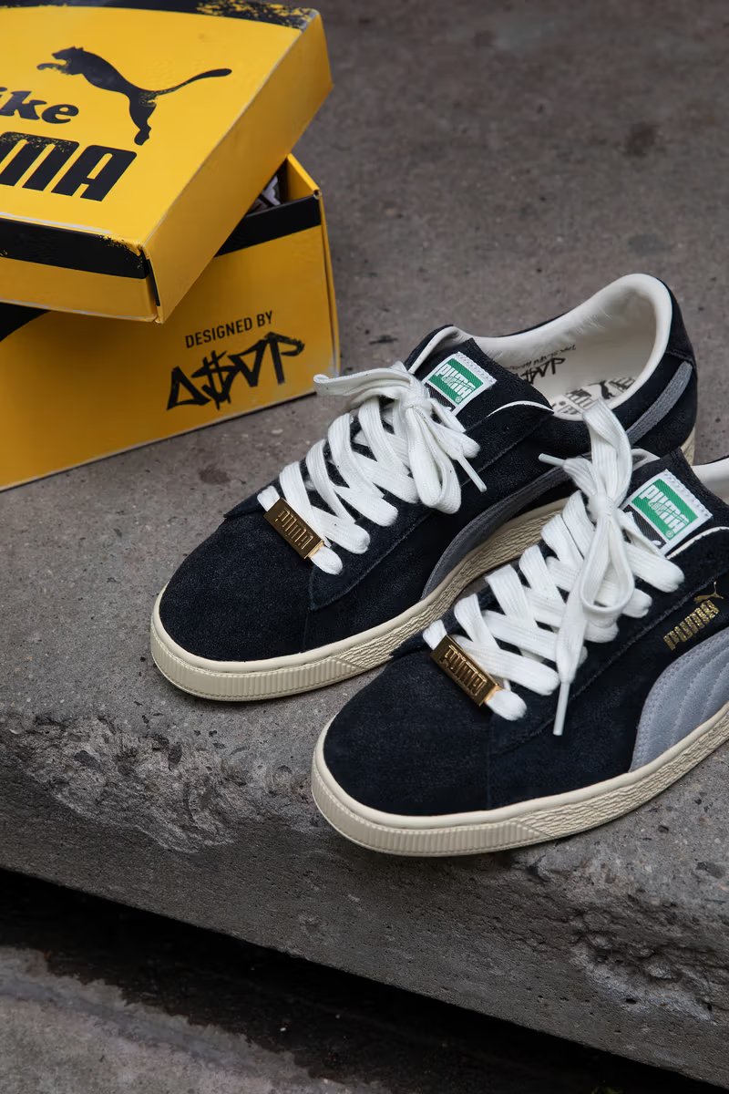A$AP Rocky x PUMA Suede '94 in black with gold lace keeper and retro quarter-panel logo, July 2026 release - detail view 5
